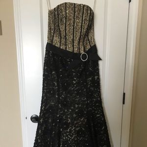 Sequenced and embroidered strapless evening gown.